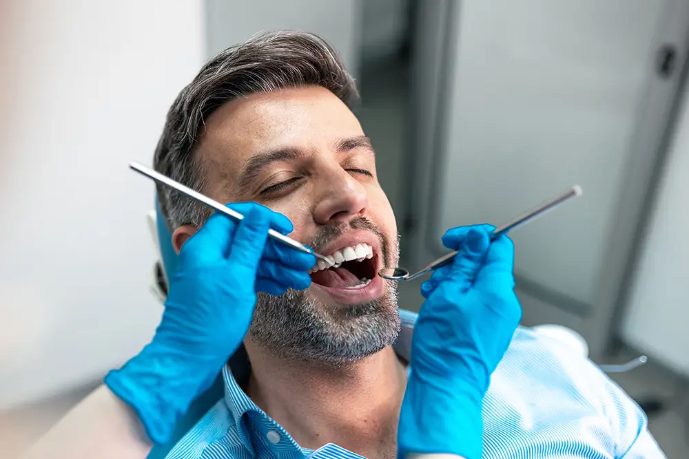 A tooth abscess is a painful infection that won't resolve on its own. Learn about causes, symptoms, treatment options, and when to see a Clearwater dentist.